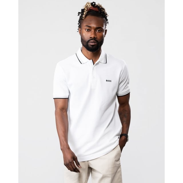 A signature polo shirt by BOSS Menswear, cut to a regular fit. Featuring contrast tipping and a logo at the left chest, this short-sleeved polo shirt is designed in cotton piqué and detailed with further BOSS branding at the undercollar.
Regular fit. Flat-knit collar. Number of buttons: 3. Short sleeves. Flat-knit cuffs. Standard length. 100% Cotton.
50469055
Model is 5"8 and wears size M