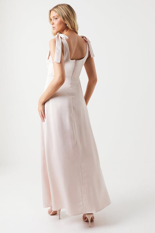 Discover a dress for all occasions and reach for it on repeat. With delicate lace trims, feminine prints and flattering silhouettes, find your perfect style to take you from day to night. From versatile midis to maxi and mini lengths, your perfect dress is only a click away. Style: Satin Tie Shoulder Midi Dress.  Ideal for: Bridesmaids.  Model wears size UK 10 and is 5' 9" tall.