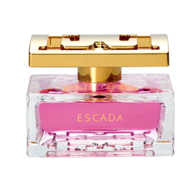 Discover the luxurious ESCADA Especially Eau de Parfum Spray, a captivating fragrance designed for the modern woman. This exquisite perfume embodies a joyful and glamorous spirit, evoking the freshness of morning dew on a sparkling rose. The scent opens with a vibrant pear note, harmoniously blended with exotic ambrette seeds. At its heart, a luxurious bouquet of rose and ylang ylang unfolds, radiating floral joy and elegance. Soft musky undertones linger, adding a subtle touch of femininity. Perfect for any occasion, this 2.5 oz fragrance is a must-have addition to your collection.