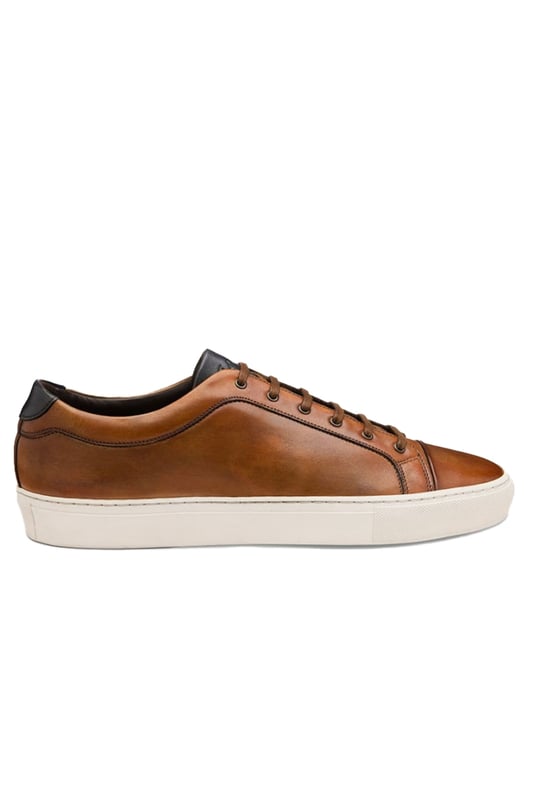 Loake Dash Hand Painted Calf Sneaker Chestnut
The Dash by Loake is a premium Calf Leather sneaker, featuring side-stitch cup rubber soles. Designed by Loake in Kettering and make to an exceptional standard, this is a great way to bring some English style and class to your casual footwear rotation.

100% Leather Upper
Premium leather
Rubber cup sole
Style - DASH