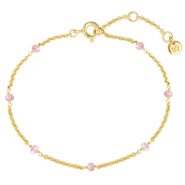 Do you like wearing special accessories and can never decide between gemstones and precious metals? Then the material mix of this bracelet from the Glanzstücken München label is designed for you: The delicate anchor chain made of yellow gold-plated sterling silver is set with precisely faceted kunzite beads - a healing stone that not only looks enchanting, but also symbolizes love, vitality and joy of life. Whether as a gift for yourself or for a loved one: the bracelet is a companion with a deeper meaning and a stylish eye-catcher on the wrist. An extension chain with a spring ring clasp ensures high wearing comfort.
