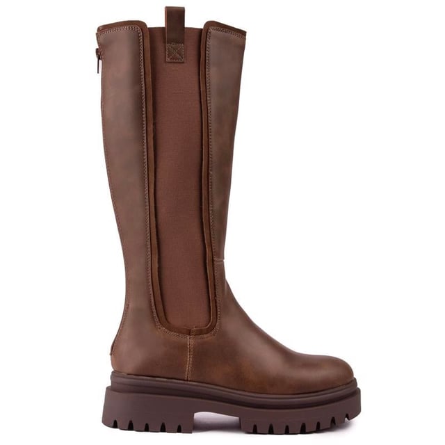 Bruine Rocket Dog dreasl-laarzen voor dames, vervaardigd met synthetisch materiaal en een synthetische zool. Kenmerken: ritssluiting aan de achterkant, volledig gevoerd, elastische zijkanten en hakhoogte 5 cm.