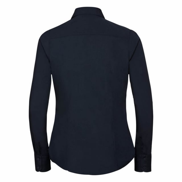 One of the great classic shirt fabrics, combining elegance with durability and wearer comfort. Smart and stylish fitted shirt design in a fine poplin fabric. Concealed placket. Stylish yoke design. Darts on bust front hem and back panel for fitted shape. Decorative top stitch on darts. Modern rounded 2 button cuffs. Rounded hem. The elegant lightweight fabric is especially suited for finer embroideries. Also available in mens sizes, code 924M. Weight: 110- 115g/m². Fabric: 65% Polyester, 35% Cotton. XS (30-32: To Fit (ins), 8: Dress Size). S (32-34: To Fit (ins), 10: Dress Size). M (34-36: To Fit (ins), 12: Dress Size). L (36-38: To Fit (ins), 14: Dress Size). XL (38-41: To Fit (ins), 16: Dress Size). 2XL (41-44: To Fit (ins), 18: Dress Size). 3XL (44-47: To Fit (ins), 20: Dress Size). 4XL (47-51: To Fit (ins), 22: Dress Size). RUSSELL COLLECTION - a variety of Mens and Womens corporatewear in a wide range of styles, colours and sizes.