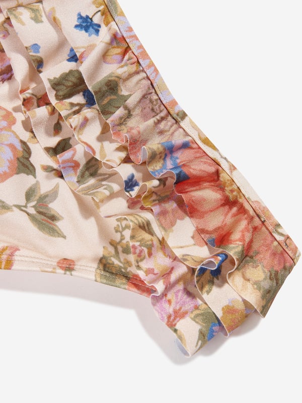 Presenting the stunning Girls August Frill Bikini Bottoms in Multicolour by Zimmermann, a lavish addition to your girl's holiday wardrobe! Key features include: Vibrant Multicolour Design: The eclectic and trendy print adds a vibrant aura, transforming it into a statement piece for those sunny beach days. Supreme Comfort: Crafted from top-tier materials, this swimsuit promotes utmost comfort, ensuring your little one enjoys her day in the sun! Stylish Wardrobe Update: Revive your kid's wardrobe with Zimmermann's Frill Bikini Bottoms. Get this holiday staple now and let your girl bask in luxury and style!