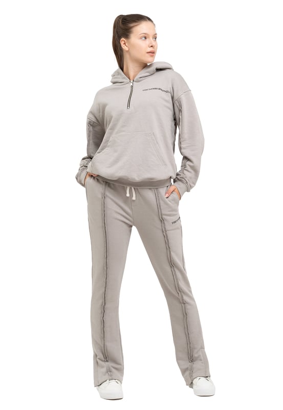 Tom Barron Dames trainingspak met kwart rits en logo in oversize