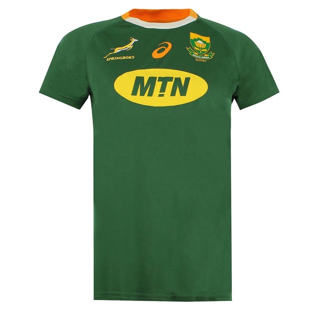 Asics Springboks South Africa Rugby Womens T-Shirt Asics Springboks South Africa Rugby Short Sleeve Women's T-Shirt, a sporty and stylish garment designed to celebrate the South African rugby team. Meticulously crafted with attention to detail, this t-shirt is perfect for rugby enthusiasts and fans who want to show their support for the Springboks.
The t-shirt features a classic and flattering fit, specifically designed for women. The short sleeves offer a comfortable and casual look, making it suitable for both athletic activities and everyday wear. Whether you're heading to a rugby match, training at the gym, or simply showcasing your team spirit, this t-shirt is a fantastic choice.
Designed in collaboration with Asics, a renowned sportswear brand, this t-shirt represents the perfect fusion of style and performance. The high-quality fabric ensures durability and comfort, making it suitable for long-lasting wear. The Asics logo is prominently displayed, symbolizing the brand's commitment to quality and innovation.
The Springboks South Africa rugby team logo is proudly featured on the front, showcasing your allegiance to the team. The iconic emblem represents the rich history and success of the Springboks, creating an immediate connection with fellow rugby enthusiasts.
Elevate your rugby fan gear collection with the Asics Springboks South Africa Rugby Short Sleeve Women's T-Shirt. Embrace the combination of sporty style and team spirit, proudly displaying your support for the Springboks. Whether you're cheering on the team from the stands or simply showcasing your love for rugby, this t-shirt will keep you looking stylish while celebrating your passion for the game.