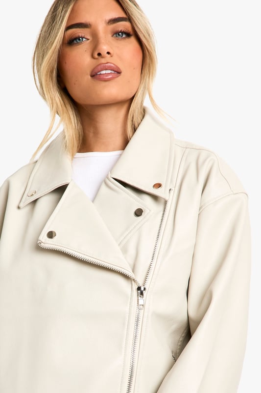 A short, close-fitting jacket complete with zips and stud detailing, rock some seriously cool vibes on the day-to-day with a biker jacket. Whether you prefer cropped, longline or a classic oversized shape for vintage vibes, biker jackets are a wardrobe classic that's perfect for edging up your outfit. Layer up your dress with a suede biker jacket, or show off your shape with a black biker jacket that's both timeless and flattering.Style: Faux Leather JacketFabric: Faux LeatherLength: LonglineSleeve Length: Long Sleeve