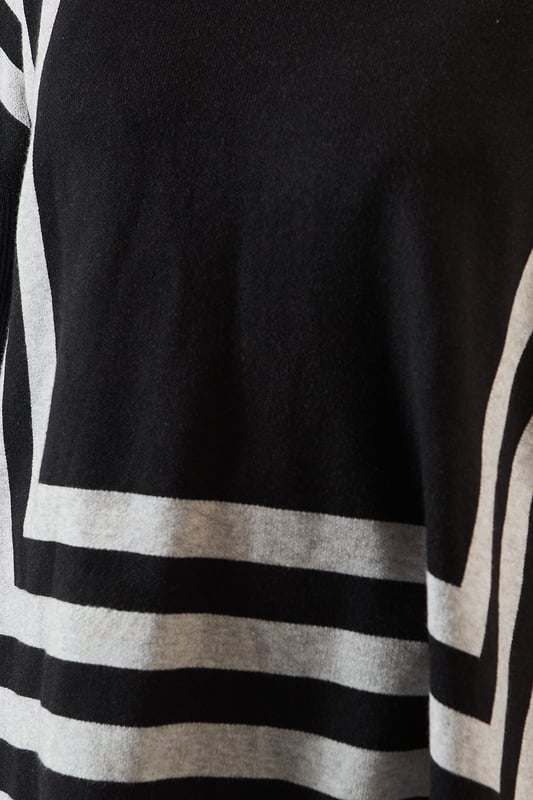Chic striped roll neck poncho design
        Oversized, relaxed fit for ultimate comfort
        Elegant contrasting stripe pattern
        Long sleeves with dropped shoulders
        Versatile length suitable for various styling options
    
    Embrace sophistication and comfort with this striking striped roll neck poncho from Wallis. The oversized silhouette offers a relaxed fit, perfect for those who appreciate both style and ease. The elegant contrasting stripe pattern adds visual interest, while the long sleeves with dropped shoulders contribute to its laid-back charm. Ideal for casual events and family gatherings, this versatile piece can be styled effortlessly. Pair it with slim-fit trousers and ballet flats for a polished daytime look, or layer it over a fitted dress with ankle boots for a more refined ensemble. The poncho's adaptable length allows for various styling possibilities, making it a wardrobe staple for the fashion-forward woman who values both glamour and practicality in her everyday attire.