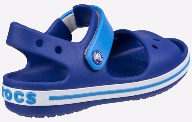 They will dazzle in our kids sandal with cute colours and a comfy fit. Jibbitz charm holes let them add a personal touch.
- Sporty Crocband style for little ones
- Croslite material cushions and comforts
- Heel and ankle strap for a more secure fit
- Comfort Rating: Iconic