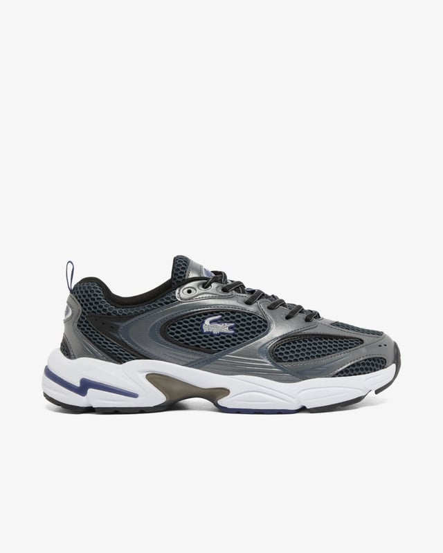 Lacoste Mens Storm 96 2K Trainers The Storm 96 2K is a creative re-imagining of the Velocity 96, Lacoste’s very first running shoe, blending 2000s running designs with modern, lifestyle-centered features. With dynamic lines and bold choices of materials, including metallic elements to create a striking style.
Mesh and synthetic leather upper
TPU plate and inserts in midsole for improved support
EVA midsole for comfort and cushioning
Textured, robust, high-grip rubber outsole
Signature crocodile on center panel, heel and tongue
Upper: 59% Polyester 41% Polyurethane; Lining: 100% Recycled Polyester; Insole: 100% Polyester; Outsole: 48% EVA 43% Rubber 9% Thermoplastic Polyurethane
48SMA0071