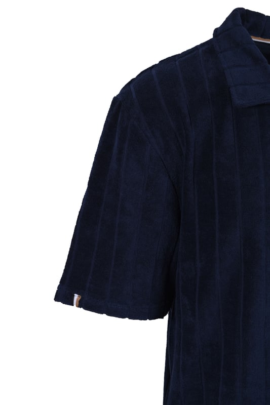 Boss Toweling Polo Shirt Navy
A super relaxed beach-side polo that is a must for the holidays and warmer seasons. made from a terry toweling and boasting the ever summery resort collar, metal logo hardware and subtle BOSS striping.

Toweling Polo
Relaxed Fit
Style - 50508847