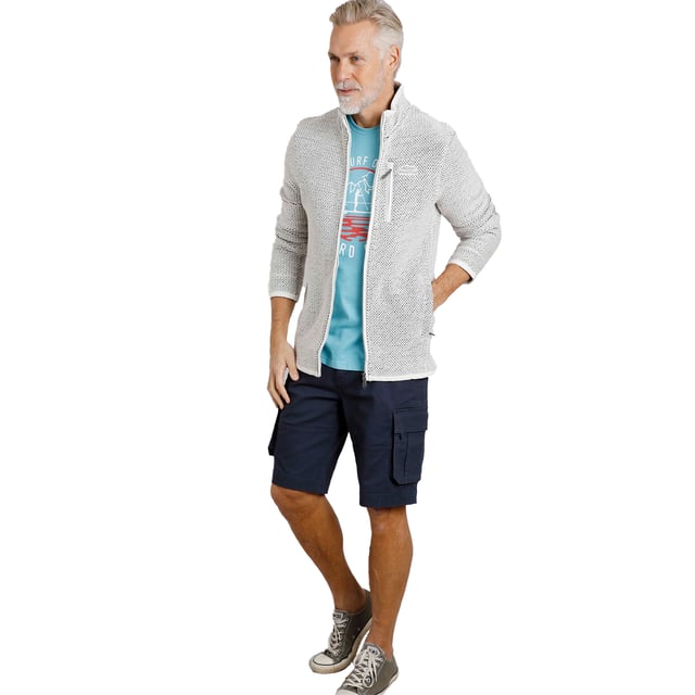 86% Organic Cotton, 14% Recycled Polyester. Fabric: Macaroni. Design: Logo. Hanging Loop. Neckline: High-Neck, Waffle Lined. Sleeve-Type: Long-Sleeved. Pockets: 2 Side Pockets, 1 Chest Pocket, Zip, Waffle Lined. Fastening: Full Zip. Sustainability: Eco Friendly, Made from Recycled Materials. S: 37 in. M: 40 in. L: 43 in. XL: 46 in. XXL: 49 in. 3XL: 52 in. 4XL: 55 in. 5XL: 58 in.