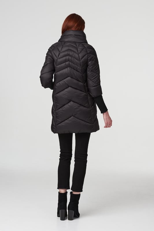 Keep warm but still on-trend with this sleek longline puffer coat. It has a high-necked collar, zip front, long sleeves with wide ribbed cuffs, handy pockets and a thigh length hem. Layer over almost any casual outfit for a practical style you can wear on repeat as it gets colder outside.
