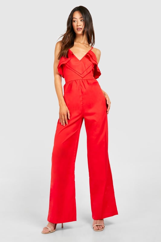 Cut those mornings in half with the help of a tall playsuit or jumpsuit from our latest arrivals. When the temperature rises, we've got playsuits for tall ladies, seen in fresh florals, ruffle sleeves and colourful prints. Take on the night in a tall jumpsuit, we're loving lace trims, plunging necklines and cut-out details. For all girls 5'7" and over, a long length jumpsuit for tall women is the effortless piece you need.Style: Wide Leg JumpsuitFabric: PolyesterLength: RegularNeckline: WrapSleeve Length: Strappy