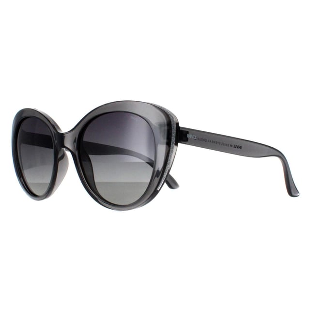 INVU Cat Eye Womens Transparent Grey Grey Polarized B2041  Sunglasses Unveil your inner diva with the INVU Designer Sunglasses model B2041C, tailored for women who adore chic sophistication. These captivating sunglasses feature a trendy cat-eye shape with a sleek transparent grey plastic frame, paired with elegant grey polarized gradient lenses. The B2041C model seamlessly fuses vintage glamour with contemporary flair, ensuring superior UV protection and all-day comfort. Available at an amazing discount from the regular retail price, these premium sunglasses are an essential accessory for any fashion-forward woman. Elevate your style and make a bold statement with the luxurious INVU experience.