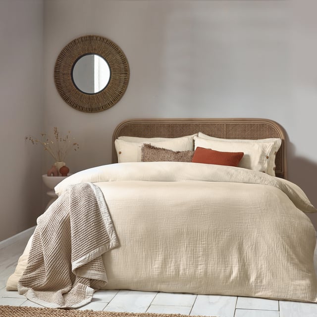Inspired by timeless classic fabrics, the Lark duvet cover set is made from ultra-soft double-layer muslin cotton fabric. Available in a range of pastel tones, this bedding is complete with a wooden button closure. The cosy crinkle texture is perfect for bringing a relaxed, stylish feel to your bedroom. Cool and breathable in the summer months and snuggly and warm in the winter, muslin is used on both sides for an understated yet modern look. This product is certified by OEKO-TEX®, showing it has been sustainably made.