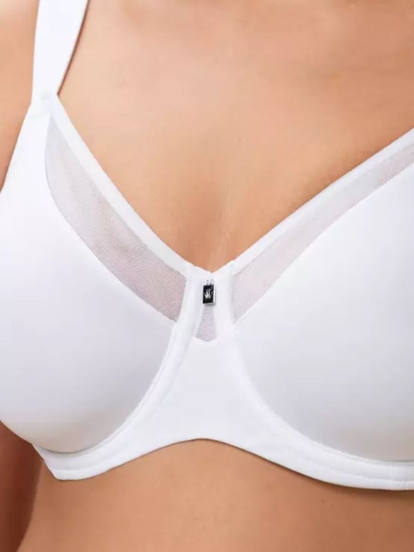 Triumph True Shape Sensation Miminizer Bra. Minimiser bra with comfort wire and mesh inserts on cups, visibly reduces bust by one cup size. This product is recommended as hand wash only.