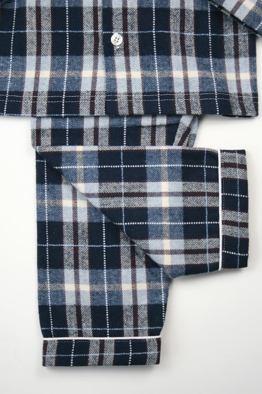 Wrap your little one in timeless comfort with our Boys' Traditional Check PJ Set, perfect for cosy nights and laid-back mornings. Made from soft, breathable cotton fabric, this classic check pyjama set features a stylish button-up top with a relaxed fit, paired with matching elastic-waist trousers for easy wear. Designed for durability and ultimate comfort, these boys' check pyjamas are ideal for lounging or bedtime.
Whether you're looking for traditional boys' sleepwear, a classic check pattern PJ set, or the perfect gift for boys, this set offers both style and cosiness. Suitable for the autumn / winter season, these boys' PJs combine heritage style with modern comfort, ensuring your child sleeps soundly and looks great.