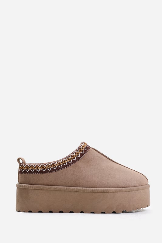Stay stylish and comfortable all day with our Freeze Flatform Embroidered Low Ankle Slipper Boots. These boots are a perfect addition to your footwear collection, featuring a chic design that you can dress up or down.
Key Features:


Effortless Style: The sleek and minimalist design of these boots ensures that they complement almost any outfit you wear. They are perfect for dressing up or down and exude casual elegance that adds an extra flair to your style.

All-Day Comfort: Our boots are built with your comfort in mind. They feature a soft and comfortable interior lining that provides maximum comfort, ensuring you can wear them for long periods with ease.

Durable Construction: Our Low Ankle Slipper Boots are made with high-quality materials that ensure long-lasting durability. They feature a sturdy construction and reliable stitching that makes them practical and sustainable for everyday use.

Specifications:

Material: Faux Suede
Closure: Slip On
Heel height: 1 inch
Toe shape: Round

Invest in our Freeze Flatform Embroidered Low Ankle Slipper Boots for a perfect combination of style and comfort. Enjoy the joy of comfort with every step you take. Get yours today and step out with confidence and style!
