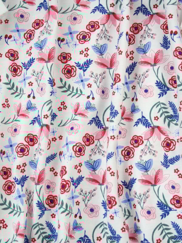 Girls Long Sleeve Cotton Night Dress
This printed nightie is both soft and cosy with plenty of room for movement. A winter floral printed skirt with plain bodice and sleeves with a pretty bow at the neck. A very classic design. 

Traditional, classic styling for our Girls lounge dress that can be worn daytime into evening.  

100% cotton
Soft Jersey fabric
Machine Wash.
Perfect Gift.