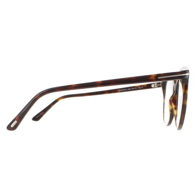 Tom Ford Round Womens Dark Havana FT5742-B  FT5742-B are a modern round style crafted from lightweight acetate. Signature Tom Ford Ts wrap around the corner flick and along the slender temples. These ready to wear glasses have blue light block lenses that help to prevent and reduce eye strain against long exposure to digital devices.