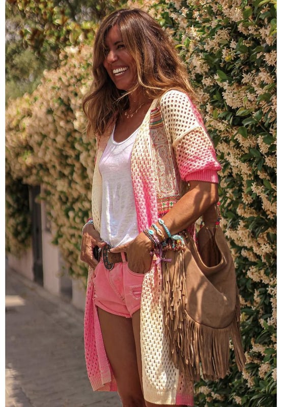 Luxurious Ribbed Short Sleeve Ombre Eyelet Knitted Cardigan
  Designed for women
  Quality materials
  Stylish ribbed texture
  Modern short sleeves
  Eye-catching ombre eyelet design
  Versatile addition to your wardrobe