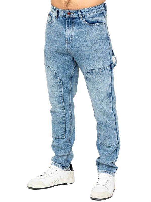 These jeans feature self-fabric panels, a loop on the left, and a loose fit for maximum ease. Other details such as the branded button, rivets, faux leather waist patch, and metal badge add a touch of personality. Choose between a relaxed fit for comfort and mobility, a timeless straight-leg cut, or a contemporary tapered fit. The signature utility pockets and hammer loop not only add functionality but also bring a unique style to the jeans.