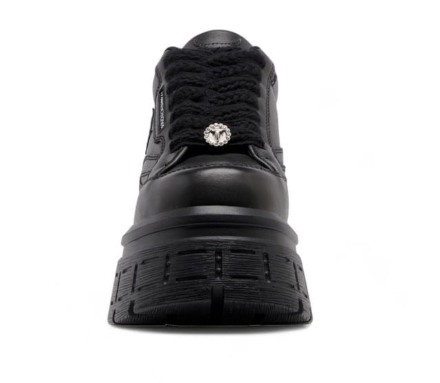 The Windsor Smith's Chunky platform sneakers that combine style and comfort effortlessly. With a lace-up design and Diamante Windsorsmith logo detailing, these sneakers add flair to any look. Perfect for everyday wear, the lightweight cleated wedge sole ensures durability, while the padded topline and contoured inner footbed offer all-day comfort.

Cow leather upper
Non-leather lining
Lightweight P.U. cleated wedge sole
Soft P.U. contoured inner footbed
Rounded toe
Padded topline
Platform height: 5.6 cm
Heel height: 7.5 cm