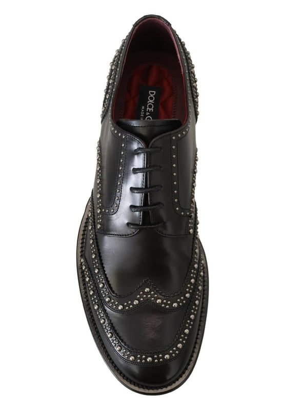 Dolce & Gabbana Men's Black Leather Derby Dress Studded Shoes Brand: DOLCE & GABBANA
Model: Lace up derby shoes
Color: Black with silver studs
Material: 100% Leather
Leather sole
Logo details
Made in Italy
Gender: Men
Material: 100% Leather