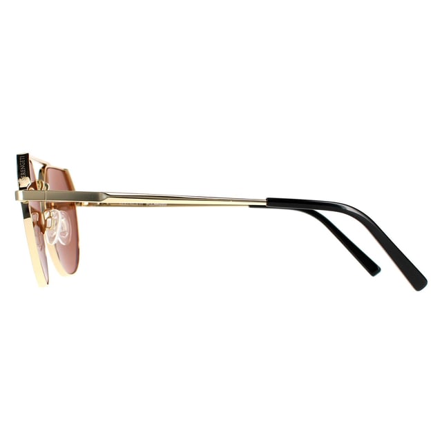 Serengeti Aviator unisex Shiny Light Gold Saturn -stuurprogramma's goud gepolariseerd Shelby Shelby zijn lichtgewicht metalen pilootstijl met een geometrisch topframe -ontwerp. Veerscharnieren en verstelbare neusstukken geven extra comfort. De geweldige fotochromische lenzen van Serengeti die zich aanpassen aan verschillende lichtomstandigheden, voltooien het geweldige pakket.