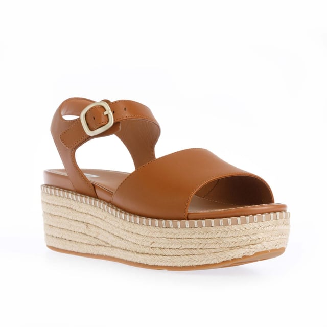 Womens FitFlop Eloise Espadrille Leather Back-Strap Wedge Sandals in light tan.Elevate your look - in every sense - with espadrille sandals on FitFlop's comfort-engineered high wedge sole.- Smooth high-quality leather uppers.- Lightly padded backstrap with adjustable buckle. - Comfortable cotton twill and leather-lined upper.- High wedge sole wrapped in natural jute for a laidback-chic summery vibe.- Statement stitching detail around the top of the sole.- Microwobbleboard midsole - absorbs shock  diffuses pressure and provides extraordinary comfort.- FitFlop branding to footbed.- Slip-resistant rubber outsole.- Average to wide fit.- Wedge height 2.8“ - 7.1cm approximately.- Leather and textile upper  Leather and textile lining  Synthetic sole.- Ref: HS5-592Measurements are intended for guidance only.