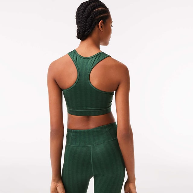 Women's Lacoste SPORT Printed Sports Bra.- Tight fit, very adjusted cut: Highlights your silhouette.- Removable cookies: For extra support. Flat seams: Prevents rubbing and irritation.- Silicone crocodile sewn onto front: Lacoste squared.- Recycled polyester: High-tech and environmentally-friendly. Material: 77% Polyester, 23% Elastane. Ref: TF3422D1R.