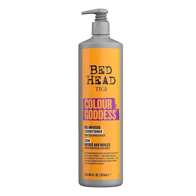 The Bed Head colour care range, with a Colour Protection System, has been tailored by professionals to care for and revive chemically treated hair and enhance colour vibrancy. This colour conditioner is oil-infused to help with colour maintenance and to keep colour looking electric. The conditioner nourishes, moisturises, smooths and conditions coloured hair to simulate a shiny salon finish.

Formulated with Sweet Almond Oil that is rich in vitamins and antioxidants and is known to condition and moisturise hair, Shea Butter for hair nourishment, Panthenol that gets converted to vitamin B5 for moisture, Vitamin E and Linseed which are powerful antioxidants, Coconut Oil for nourishment and hydration, and Keratin to help structure and repair hair. Leaving hair smooth, conditioned and frizz-free.

•Bed Head’s Colour Goddess Conditioner: A colour-enhancing formulation, not only designed with but used by salon professionals. Delivering salon results and salon experience at home.
•FOR WHO: Perfect for coloured hair, especially for highlighting brunette, copper and red tones.

Package Includes: Bed Head Colour Goddess Conditioner 970ml