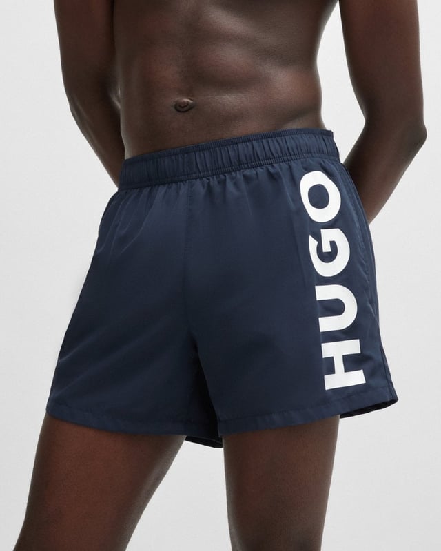 Modern swim shorts by HUGO. Designed in quick-drying fabric with full lining, this beach-ready pair features a vertical logo printed in contrast.
100% Polyester (recycled) , Lining: 100% Polyester
50513979