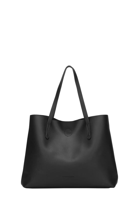 Let simplicity be key with the Ophelia tote bag, perfect for taking your look through the week. In a range of colours this tote is made from unlined PU making it lightweight and spacious. With simple design features such as the Claudia Canova debossed logo, this bag is perfect for everyday sleek style. The bag fastens with a mag-dot clasp and inside reveals an inner pouch with a zip fastening to keep all your daily essentials safe. Features: , Unlined PU, Claudia Canova debossed logo, Mag-dot clasp fastening, Twin grab handles, Soft and flexible shape, Removable inner pouch with zip fastening Style Ref: 84395