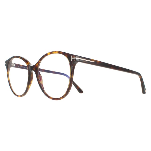 Tom Ford Round Womens Dark Havana FT5742-B  FT5742-B are a modern round style crafted from lightweight acetate. Signature Tom Ford Ts wrap around the corner flick and along the slender temples. These ready to wear glasses have blue light block lenses that help to prevent and reduce eye strain against long exposure to digital devices.