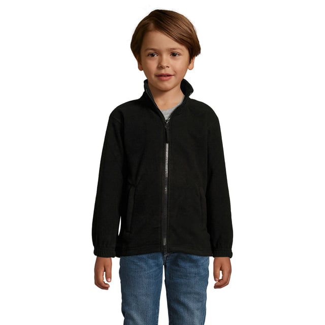 Pill resistant. High density. Unlined. Taped back neck. Collar high full zip. Two front zip pockets. Elasticated cuffs. Open hem with drawcord. Fabric weight: 300 gsm. Material: 100% Polyester. Size (years): 4, 6, 8, 10, 12. Height (cm): 96-104, 106-116, 118-128, 130-140, 142-152.