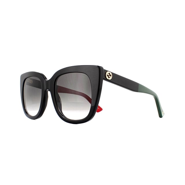 Gucci Sunglasses GG0163S 003 Black with Red and Green Brown Gradient are a sophisticated square cat eye style crafted from thick acetate. Temples feature the Gucci interlocking GG logo as well as the bumblebee motif at the temple tips.