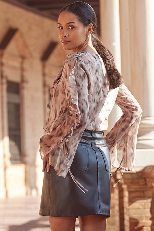 We consider it a wardrobe staple
Crafted from butter-soft leather for ultimate luxury
Cut for a flattering A-line fit
Work, weekend, night out - it's got you covered
Effortless chic with a striped knit and boots
Dress it up with strappy heels and a glam top