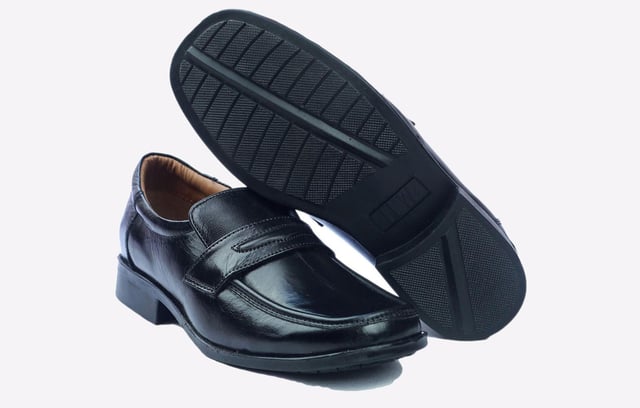Smart slip-on dress shoe in a formal loafer style crafted with a genuine leather upper and leather lining.  - Leather upper
 - Slip-On design
 - Cushioned footbed
 - Slight raised heel
 - PU Sole