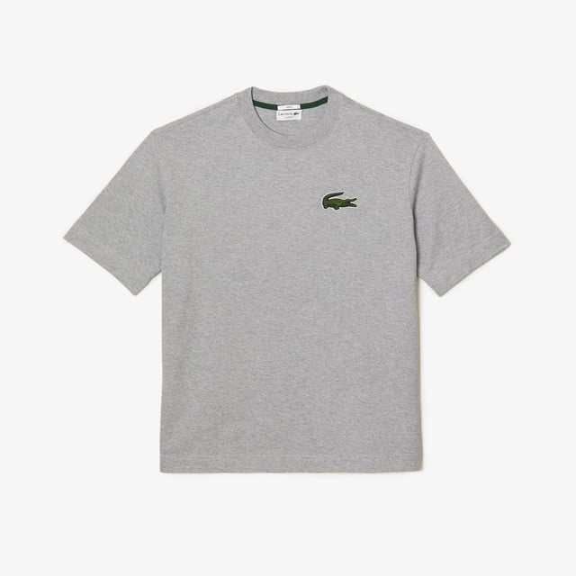 Finest materials. Brand’s singular expertise. The perfect expression of Lacoste’s timeless wardrobe -Loose fit is loose ease on body and sleeves  lower shoulders and armholes -Unisexe T-shirt in organic heavy jersey with big croc 80' on chest -7cm iconic original badge crocodile at chest -3cm green crocodile at under middle back collar