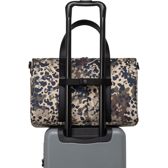 Carry on the go. Herschel re-invented their bestselling duffle for carry-on travel. Built with a padded laptop sleeve and trolley strap, it attaches to your luggage for your next trip.
