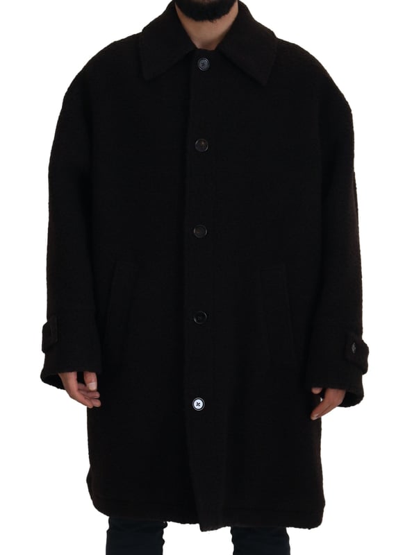 100% authentiek Dolce & Gabbana donsjack met knopen
  Vervaardigd in Italie
  Volledige knoopsluiting
  Strakke zwarte kleur
  Logo details
  Materiaalsamenstelling: 45% Alpaca 45% Wol 10% Nylon
  Voering: 100% Viscose