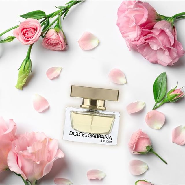 Dolce & Gabbana 'The One' was launched in 2006. As it was envisioned by designers, The One is a fragrance for an exceptional woman who instantly draws attention, not only with her looks, but also with her manners, pose, and inner world.

This fragrance, like all of the fragrances of the D&G house, is a 'fragrance with character', special and alluring. Its oriental floral-fruity composition is very warm and sensual with a powdery vanilla trace. Every aspect of the fragrance has been honed with even the colour of the fragrance ideally matching its tone. The women’s fragrance, The One has a glass bottle with clean, geometric lines and a refined silhouette. Dolce & Gabbana is an Italian luxury fashion house founded in 1985. Making an immediate impact with their signature clothing they then created their first fragrance which was launched in 1994.

Product Features :
Fragrance for women from the designer house of Dolce and Gabbana.
Top notes of mandarin, lychee, and peach.
Middle notes of jasmine, lily of the valley, white lily, and plum.
Base notes of vetiver, amber, musk, and vanilla.

Box Contains: Dolce & Gabbana The One Perfume For Women, 30ml