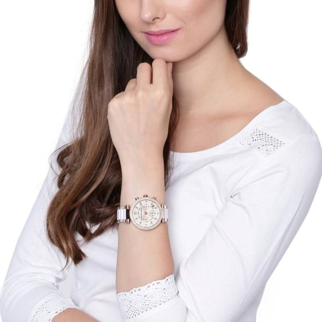 Brand: Michael KorsModel Number: MK5774SKU: MK5774Case Size: 39 mmMovement: Quartz ChronographPlatform: PARKERStrap Material: Acetate, Stainless SteelStrap Color: Rose GoldCase Water Resistance: 10 ATMCase Material: Stainless SteelCase Color: Rose GoldDial Color: WhiteStrap Width: 12 mmClosure: Bracelet DeployantStrap Inner Circumference: 190 +/- 5 mmBattery Type: SR621SW