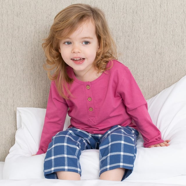 New! Very special organic cotton pyjamas that will help your little one snooze in comfort and style. Offering the softest single jersey grandad style top with coconut button details in our seasonal rhubarb pink, and our super-soft navy blue and cream brushed check trousers for next-to-skin comfort and kindness.