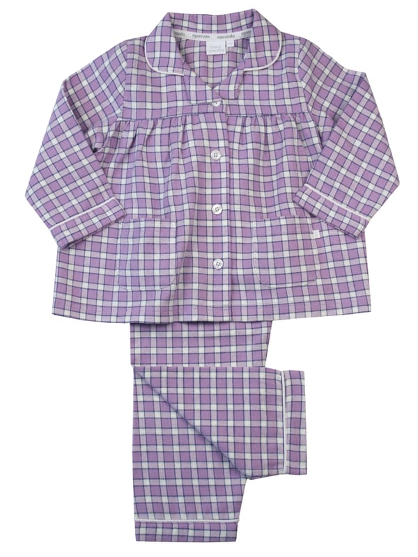 New for this Season...A great staple design for any girls pyjama drawer. Made in a beautiful soft brushed Cotton, this pyjama set has a small delicate check design using a Lavender Violet colour yarn with navy and ivory highlights. Always 'On Trend' and never out of fashion - they are Classic and Traditional in styling. Our signature design has white piping details around the collar and cuffs. With plenty of gathers, 2 patch pockets and engraved pearl effect buttons and your little one will be ready for the Autumn into winter.