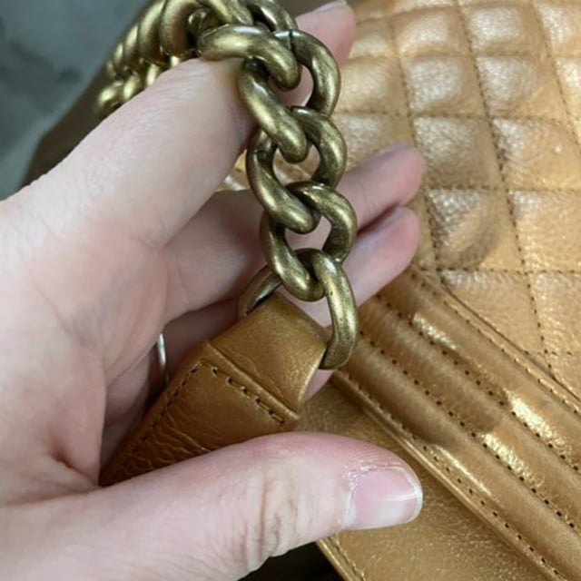 VINTAGE, RRP AS NEW
Elevate your ensemble with the timeless allure of the Chanel Quilted Medium Boy Flap Bag in sumptuous brown lambskin leather. This chic shoulder bag epitomizes luxury with its diamond-quilted pattern and opulent feel. The bag showcases an aged gold chain link shoulder strap adorned with a leather shoulder pad, providing both comfort and style. The focal point is the aged gold Boy Chanel CC press lock that adds a touch of glamour. Opening the front flap reveals a matching fabric interior that includes a convenient patch pocket for organization. Perfect for adding a touch of refinement to any outfit, this Chanel bag is an iconic piece that exudes sophistication and elegance in every detail.

with Dust bag

Chanel Quilted Medium Boy Flap Bag in Brown Lambskin Leather
Condition: Excellent
Signs of wear: No retail tag, No visible sign of wear., 
Packaging: Dust bag
Color: Brown | ochre
Material: Leather | Lambskin leather
Size: One Size
Measurements: Width: 80; Height: 150; Length: 260; Handle drop: 250; Strap length: 600
SKU: NAPPUGBBA385936W