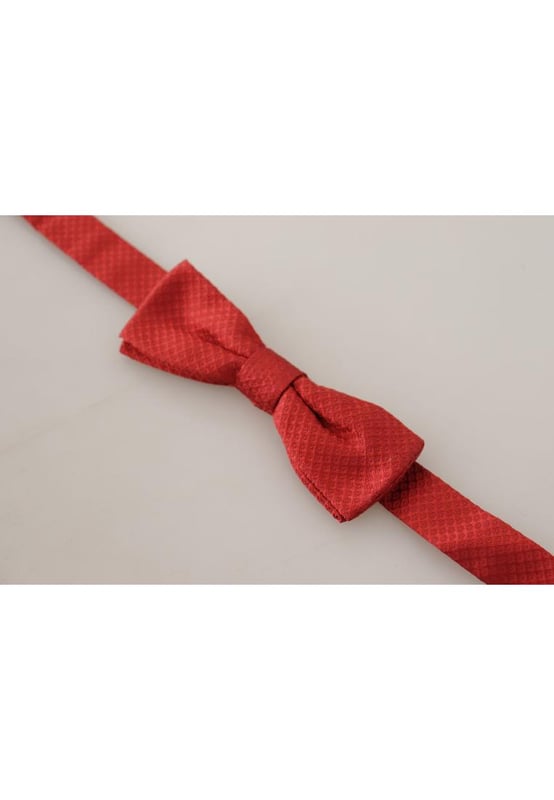 Absolutely stunning 100% Authentic brand new with tags
  From the exclusive Dolce & Gabbana collection
  Color: Red
  Model: Tied
  Material: 100% Silk
  Adjustable length neck strap one size
  Made In Italy
  Width: 4cm