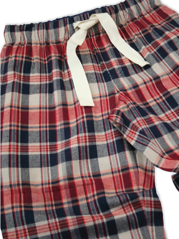 Navy beige & red brushed check unisex lounge pants by Vanilla Park for Adults
There’s nothing cosier than check nightwear in the winter. Our Rayner pyjama trousers are made from brushed 100% cotton for a comfy, warm feel and are trimmed with navy cotton. Fully elasticated at the waist, with an adjustable front drawstring the trousers have two side pockets. Wear it with a jersey T-shirt for the perfect way to lounge or sleep when temperatures tumble.
100% Cotton
Machine Washable
Super soft luxury brushed cotton fabric
Comfortable jersey inner waistband
Unisex.